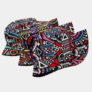 Ethnic print reversible bucket hats in vibrant geometric tribal patterns for sun protection
