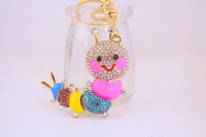 Close-up of colorful rhinestone caterpillar keychain with vibrant metal segments