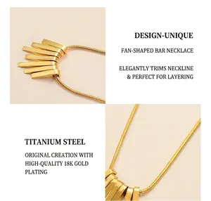 Detailed macro view of 18K gold-plated surgical titanium steel necklace with rectangular bar pendants
