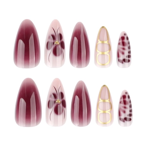 Almond shaped press-on nails with purple gradient, floral patterns and leopard prints