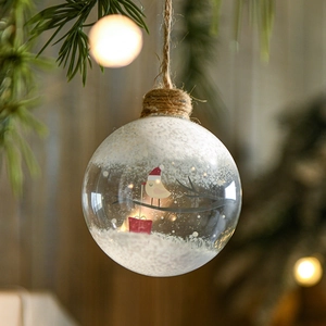8cm clear glass Christmas ball with painted bird and snow scene hanging on tree