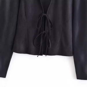 Slim fit black long sleeve top for women featuring front tie-up ribbon bow detail
