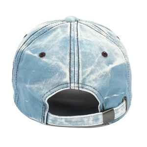 Detail view of washed denim baseball cap featuring adjustable metal buckle and stitching