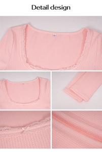 Detail showing pink waffle knit fabric with lace trim and small bow on the u-neckline