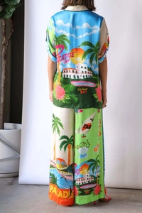 Rear view of tropical print lounge set with wide leg pants and matching shirt