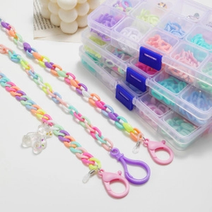 Detail of colorful acrylic beads eyewear chain with bear charm and organizer box