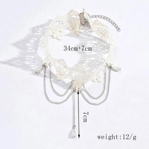 Detailed view of white lace choker necklace with pearl pendant and size specifications
