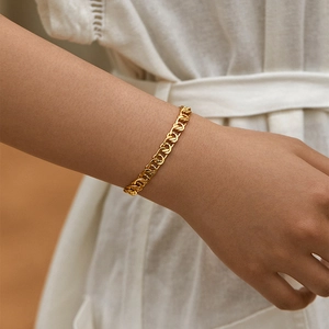 Elegant 18K gold-plated brass chain bracelet worn on wrist for a stylish look