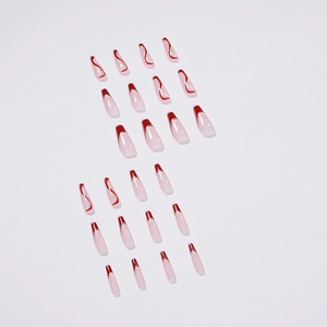 French tip press-on nails in cherry red and nude pink with silver glitter streamlines