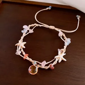 Handmade ocean-themed braided bracelet with starfish and colorful natural stones