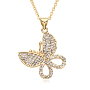 Macro shot of gold plated butterfly pendant necklace with sparkling clear zircon stones