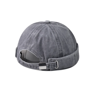 Detail view of washed grey cotton brimless cap with adjustable metal buckle at the back