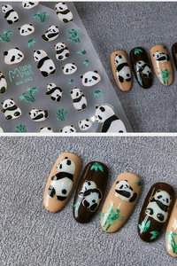 Detail of MN-242 panda nail stickers with golden outlines and green bamboo patterns