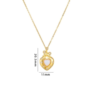 Detail shot of a golden heart castle pendant with opal inlay and precise size dimensions
