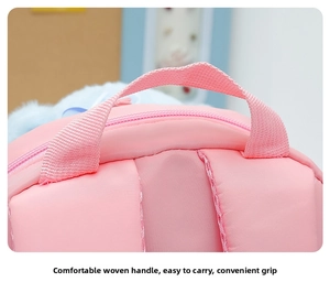 Detail of reinforced nylon handle and durable stitching on pink cartoon bear backpack