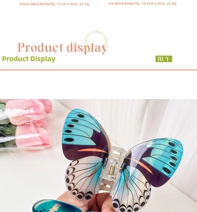 Detailed view of large butterfly hair claws in green and blue with size specifications