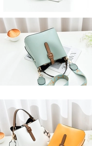 Detailed close-up of colorful PU leather bucket bags with wide straps in a lifestyle setting