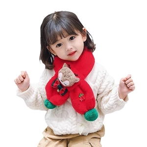 Kids plush red Christmas scarf featuring cute deer, green pompom and festive bells