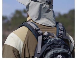 Detail of light grey sun hat with neck flap and elastic drawstring for outdoor hiking
