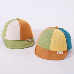 Detail of color-block baby soft brim baseball hats in breathable cotton fabric