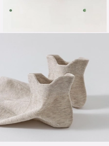 Detail view of cotton low cut socks with heel tab and 3D massage sole texture