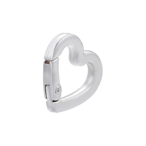 Macro shot of silver heart-shaped spring clasp connector for DIY jewelry making
