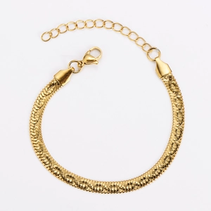 Close-up of golden flat snake chain with adjustable lobster clasp and extender