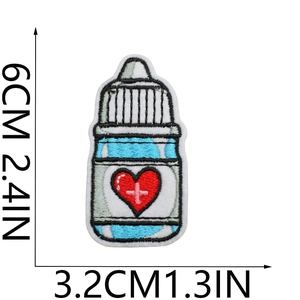 Detail of medical bottle embroidered patch with dimensions 6cm by 3.2cm in blue and white