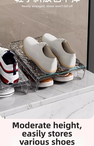 Detail of transparent water ripple acrylic shoe rack showing the stackable metal support design