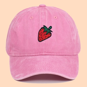 Pink washed cotton baseball cap with strawberry embroidery and adjustable back strap