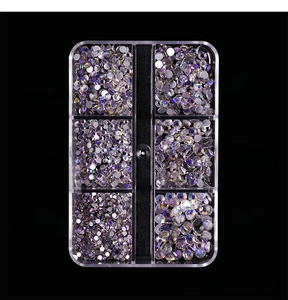 Macro detail of 6-grid assorted sizes AB clear flatback rhinestones for nail art