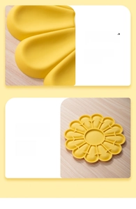 Detail of yellow daisy silicone mat with hollow heat dissipation and smooth edges