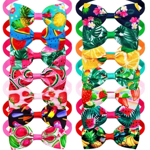 14-piece fruit pattern pet bow tie set with watermelon and strawberry prints