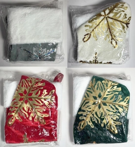 Detail of velvet Christmas stockings with sequin snowflake patterns in four colors