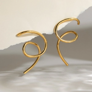 Minimalist gold spiral earrings in polished stainless steel with double hoop design