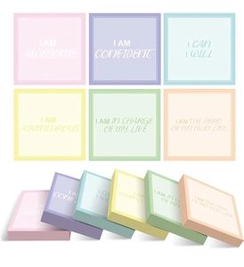 Detailed close-up of colorful square self-adhesive sticky notes with motivational quotes