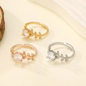 Luxury zircon leaf ring set in gold, rose gold and silver finishes with adjustable band