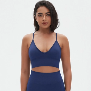 Detail of dark blue seamless sports bra and high-waisted ribbed leggings set