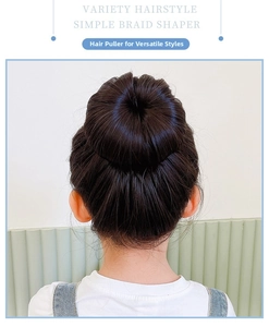 Detail showing a girl with a neat bun hairstyle using the hair styling tool for kids