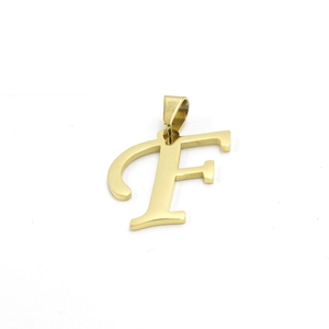 Macro detail of a 18k gold plated stainless steel initial F pendant with clasp