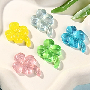 Transparent glitter resin four-leaf clover charms in five vibrant colors for DIY jewelry