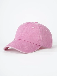 Detail view of pink cotton baseball cap featuring six-panel construction and stitching