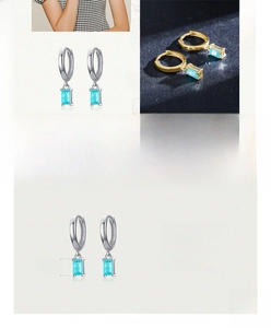 Macro shot of S925 sterling silver hoop earrings with rectangular 3x5mm blue gemstone