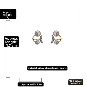 Detail view of pearl fish tail earrings with measurements 1.7cm x 1.5cm and 925 silver post