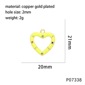 Macro detail of heart-shaped yellow enamel pendant with colorful stones and bamboo texture