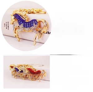 Detailed view of rhinestone-encrusted horse keychain made of durable zinc alloy metal