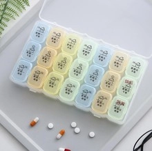 Detailed 28-grid weekly pill organizer with 4 daily compartments and clear color coding