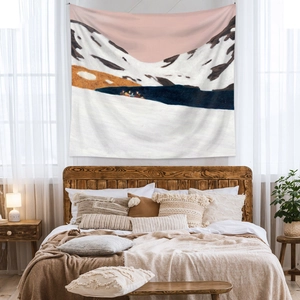 Detail of abstract mountain scenery tapestry with soft pink and blue tones on bedroom wall