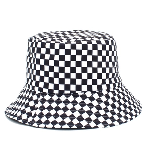 Classic reversible checkerboard bucket hat with black and white plaid pattern for sun protection