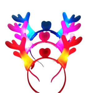 Light-up reindeer antler headbands with glowing hearts in red, pink, and blue colors